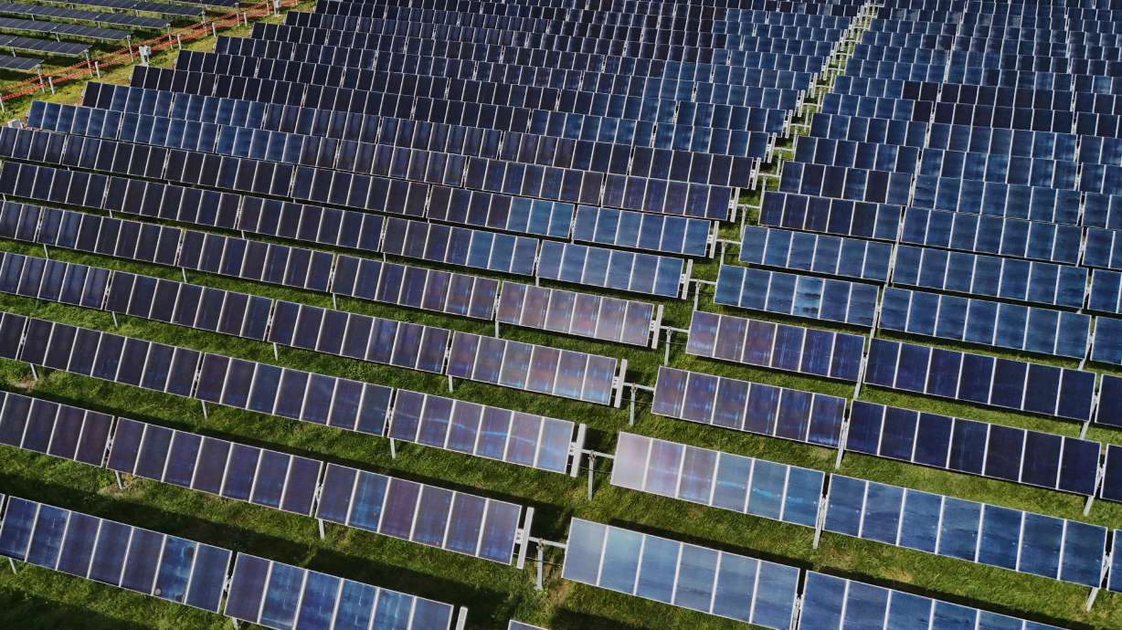 Solar panels operate April 28, at a farm in Christiana, Tenn.
