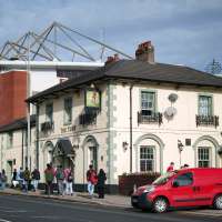 Cheers! Wrexham's celebrity owners buy 'The Turf' pub that's adjacent to the club's stadium