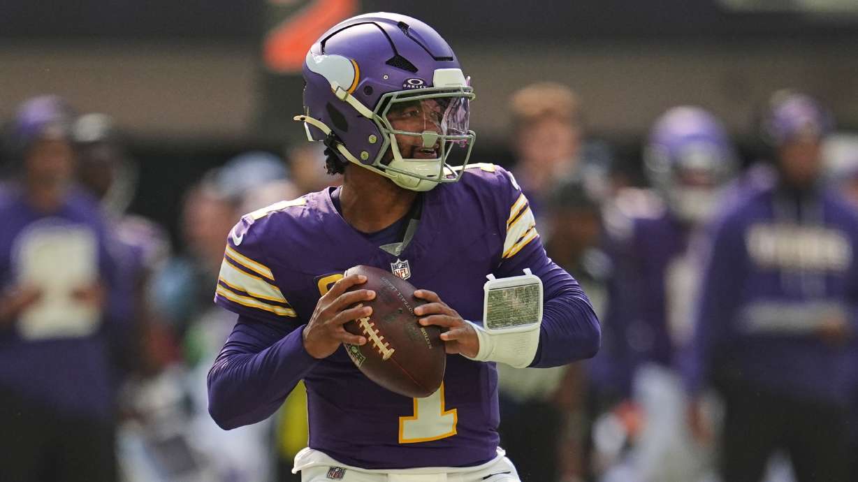 Minnesota Vikings quarterback Kyler Murray drops back to pass during the first half of an NFL football game against the Green Bay Packers Sunday, Sept. 13, 2026, in Minneapolis, Minn.