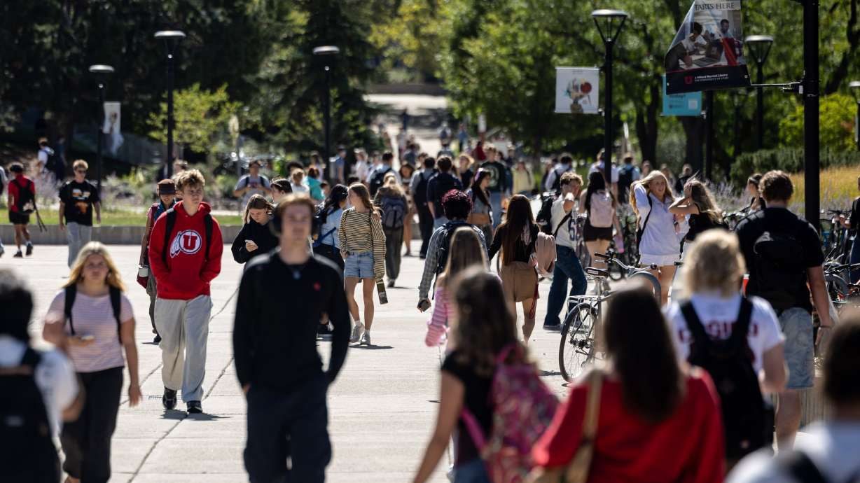 Students walk across campus at the University of Utah in Salt Lake City on Sept. 14. Utah ranks last out of 51 for student debt, a new survey showed.