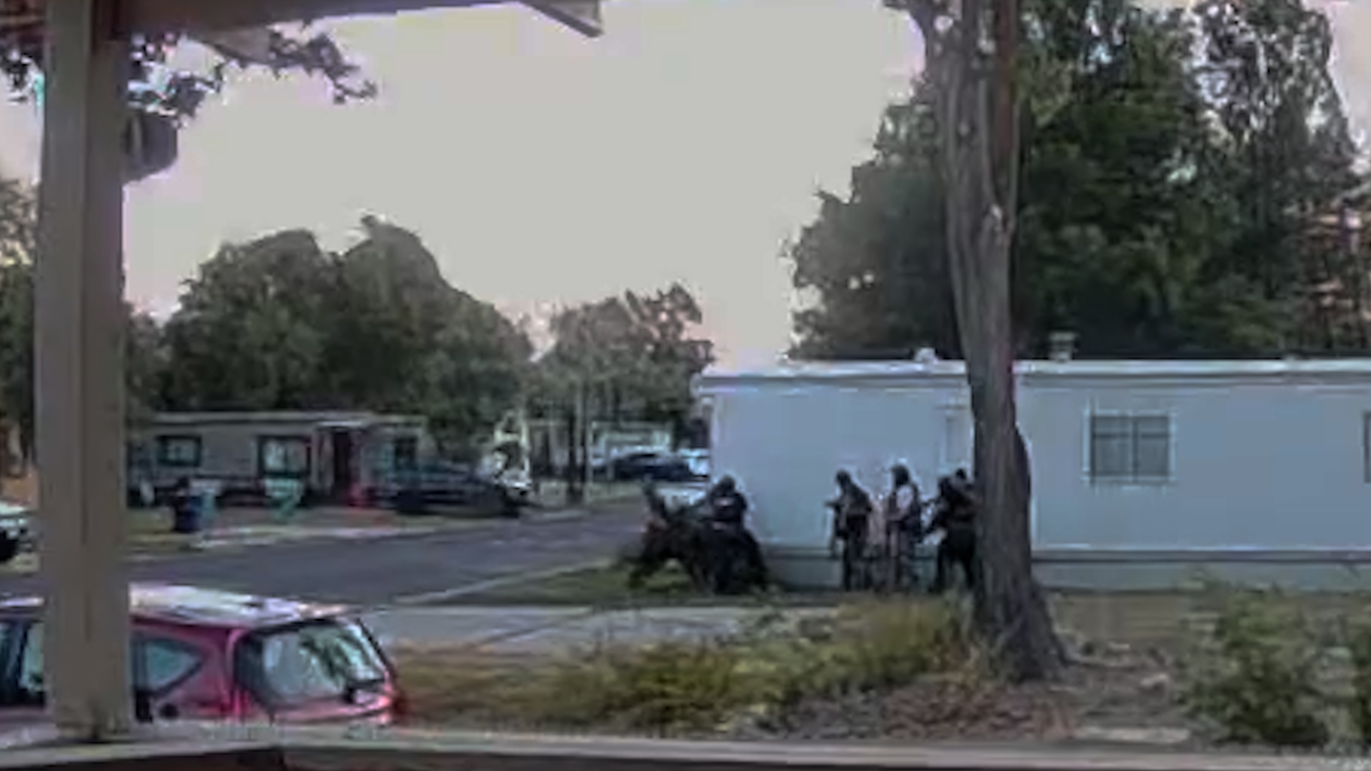 Doorbell camera footage shows law enforcement engaged in a standoff with suspect Jorge Andrade in June 2025.