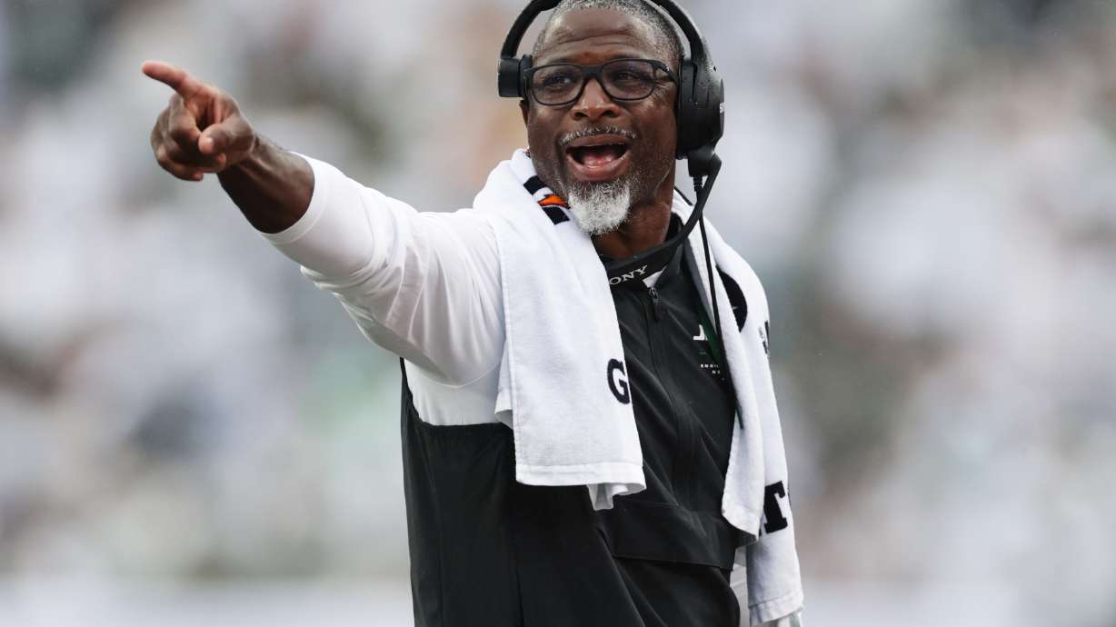 New York Jets head coach Aaron Glenn points on the field during an NFL football game against the Green Bay Packers in East Rutherford, N.J., Sunday, Sept. 20, 2026.