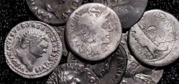 Amateur archaeologist finds Germany's biggest hoard of ancient Roman silver coins