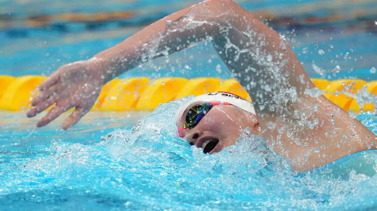 Li Bingjie of China competes in the women's 400-meter freestyle final in swimming at the Asian Games in Tokyo, Sept. 22, 2026.