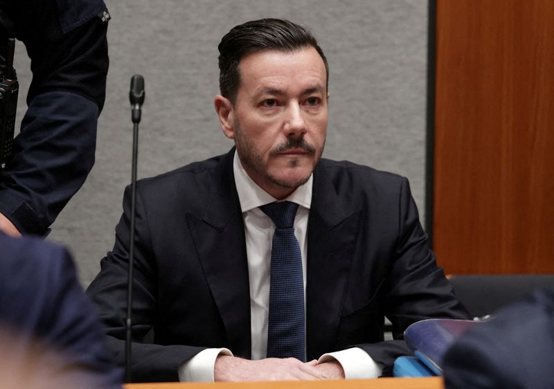 FILE PHOTO: Austrian former billionaire Rene Benko waits for the start of his trial, in the first case tackling the collapse of his property group Signa, in a courtroom in Innsbruck, Austria, October 15, 2025.
