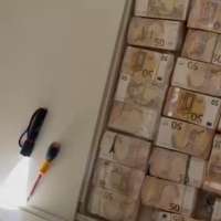 Italian police find $3.6 million in cash hidden in apartment's walls, floors and furniture