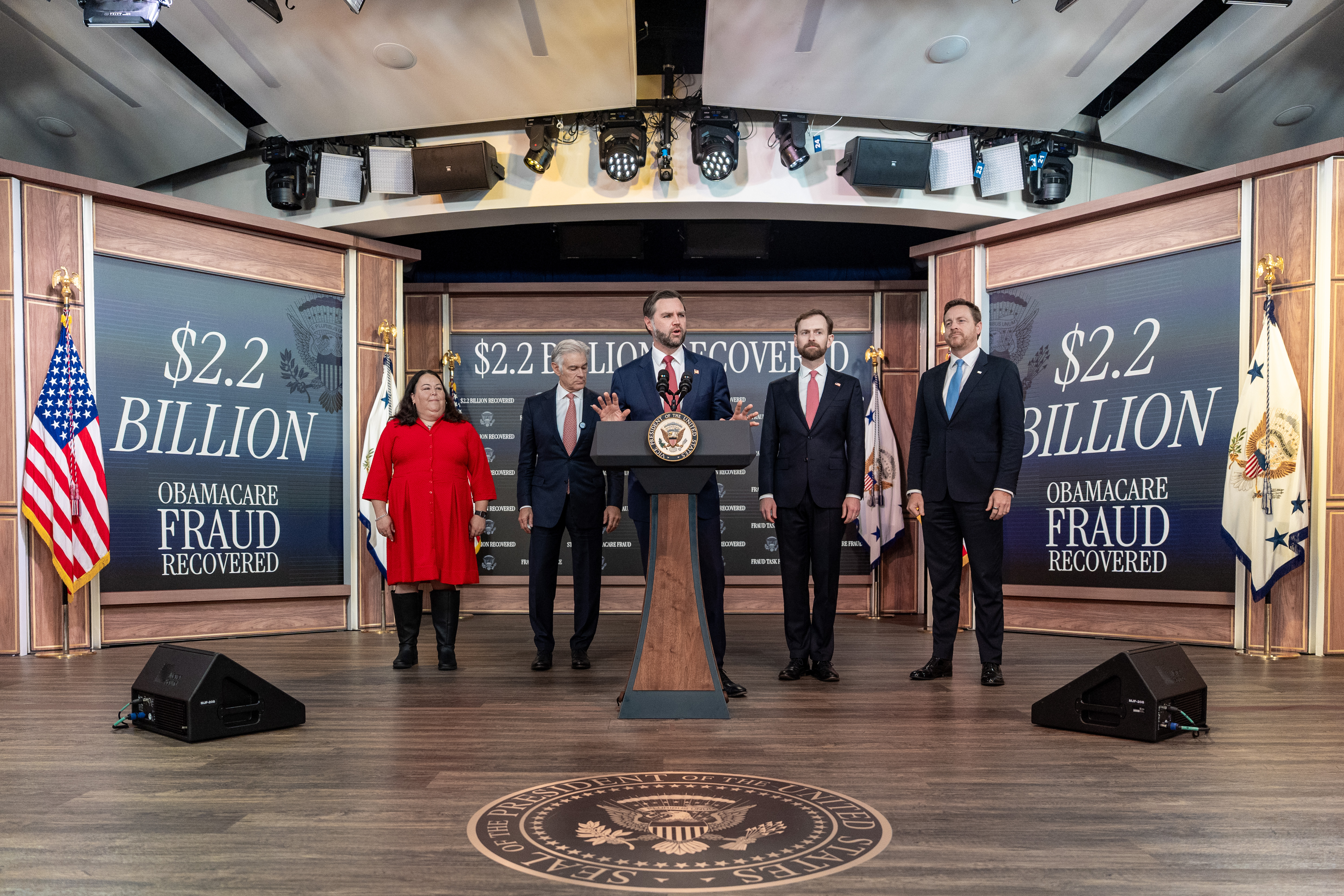 Vice President JD Vance, center, speaks during a news conference accompanied by Kim Brandt, Chief Operating Officer for the Centers for Medicare and Medicaid Services, left, Dr. Mehmet Oz, Administrator for the Centers for Medicare & Medicaid Services, Chairman Andrew Ferguson of the Federal Trade Commission, and Chris Klomp, nominee for Deputy Secretary of Health and Human Services, in the South Court Auditorium in the Eisenhower Executive Office Building on the White House campus, Tuesday, in Washington.