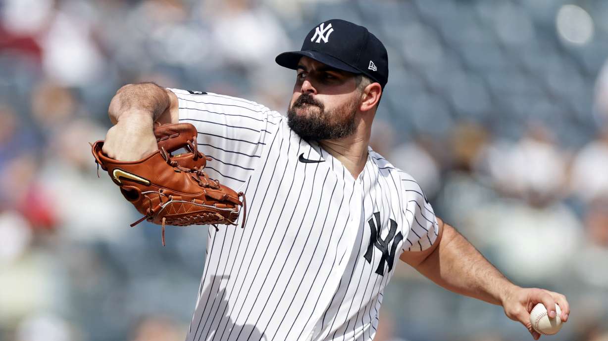 New York Yankees pitcher Carlos Rodon throws in the first inning during the first baseball game of a doubleheader against the Tampa Bay Rays, Tuesday, Sept. 22, 2026, in New York.