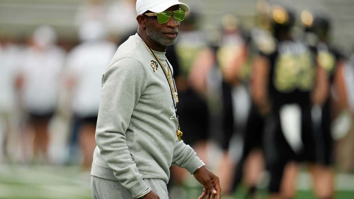 Colorado head coach Deion Sanders walks on the field before an NCAA college football game between Georgia Tech and Colorado, Thursday, Sept. 3, 2026, in Atlanta.