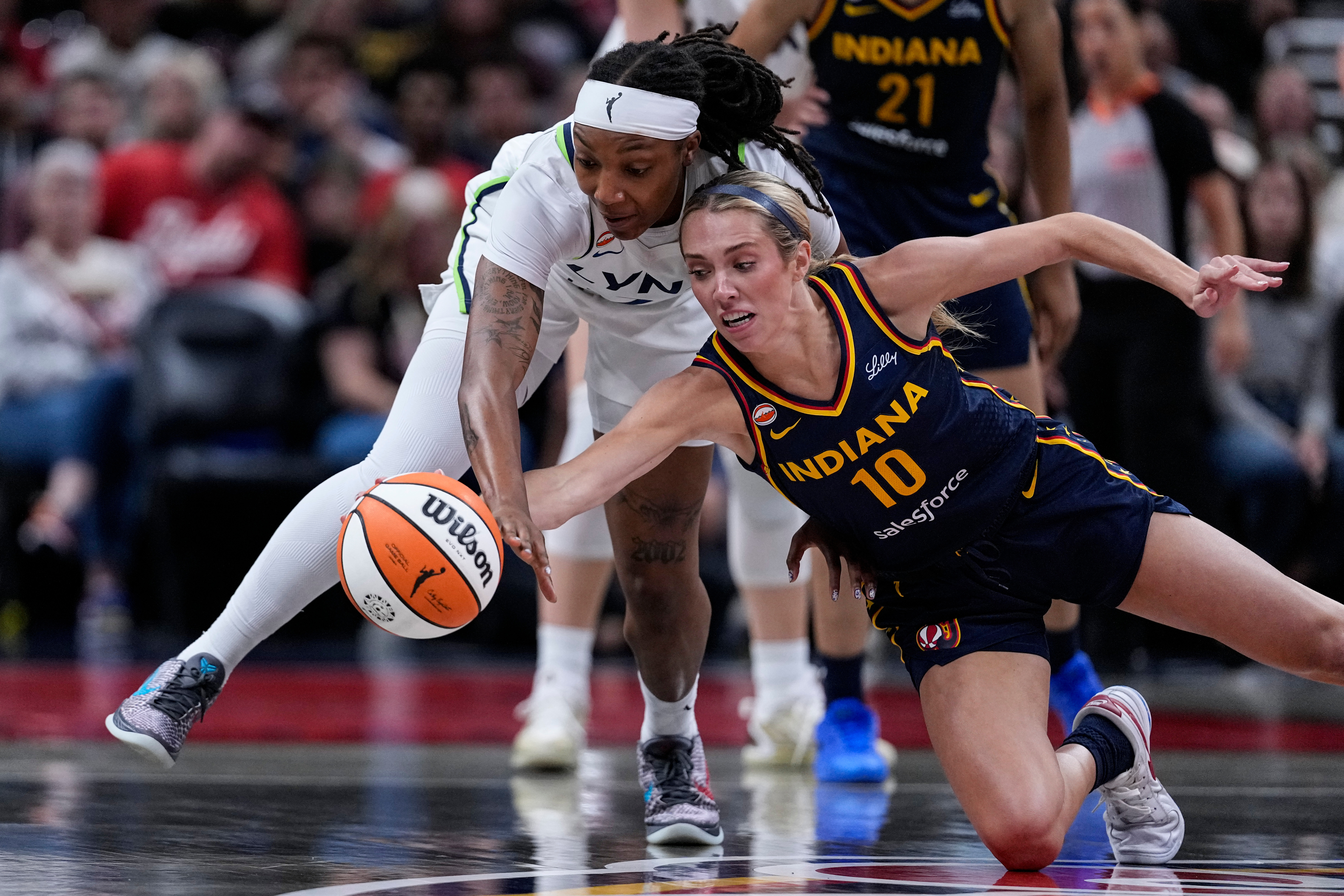 Caitlin Clark and Kelsey Mitchell help Fever keep home-court hope alive with 96-77 win over Lynx