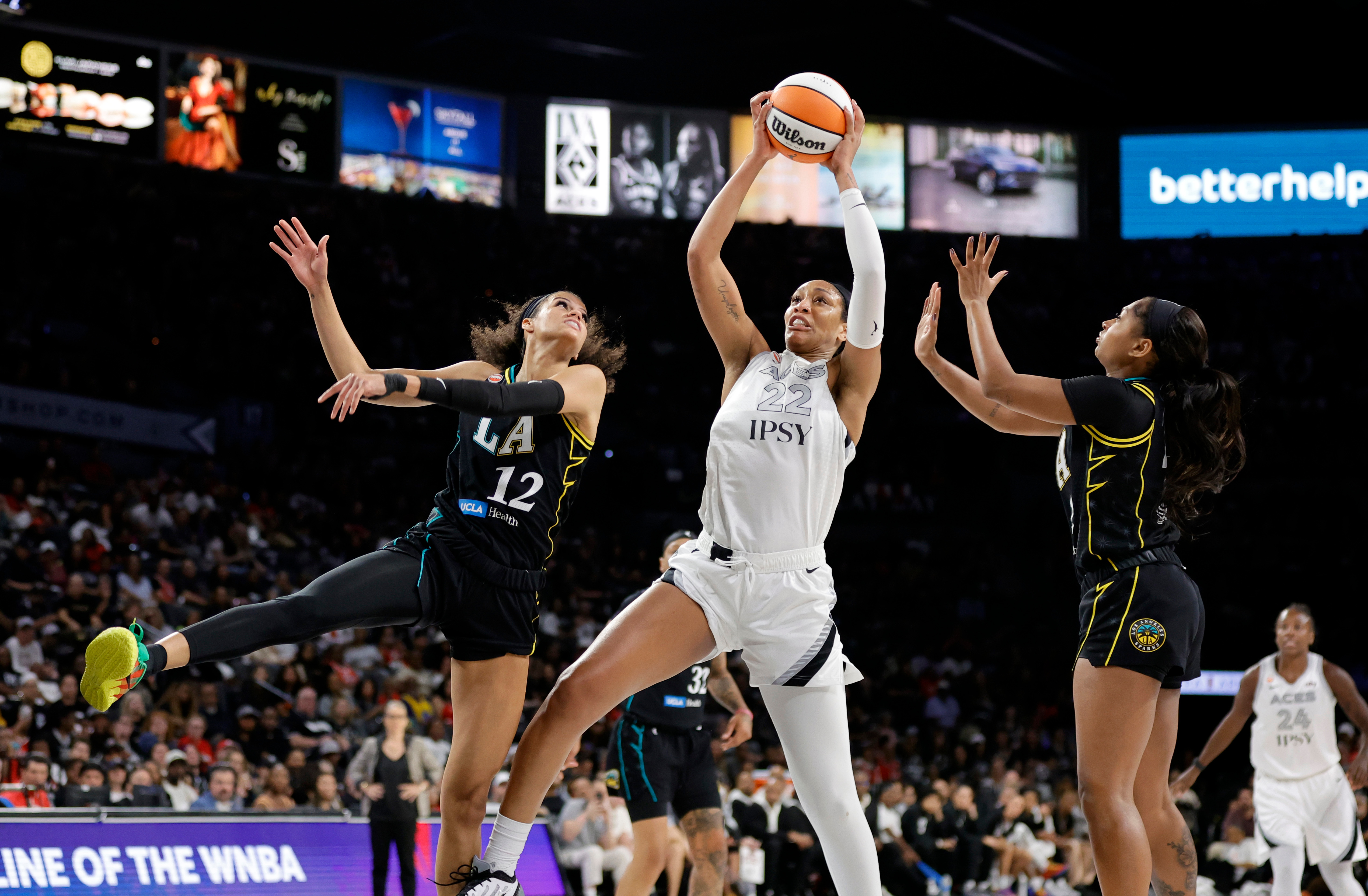 A'ja Wilson powers the Aces past the Sparks, clinching at least a No. 3 seed