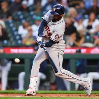 Alvarez hits 41st homer and drives in 3 as Astros blank Mariners 7-0 to tie Rangers atop AL West