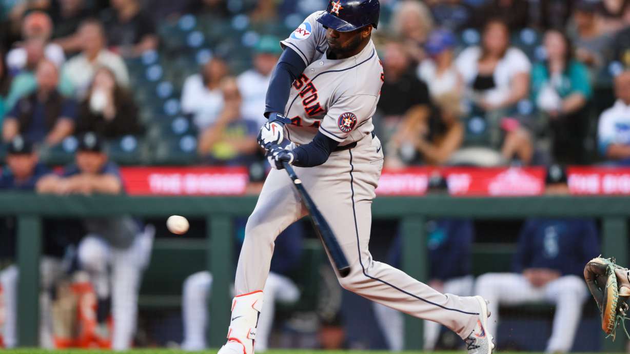 Houston Astros designated hitter Yordan Alvarez (44) hits an RBI single in the first inning of a baseball game against the Seattle Mariners, Tuesday, Sept. 22, 2026, in Seattle.