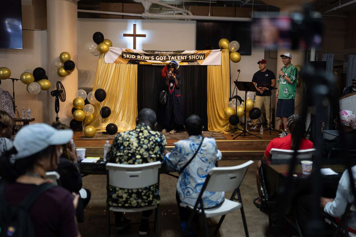 A contestant who goes by the nickname Queen Mussolini performs at Skid Row's inaugural talent show in downtown Los Angeles, Saturday.