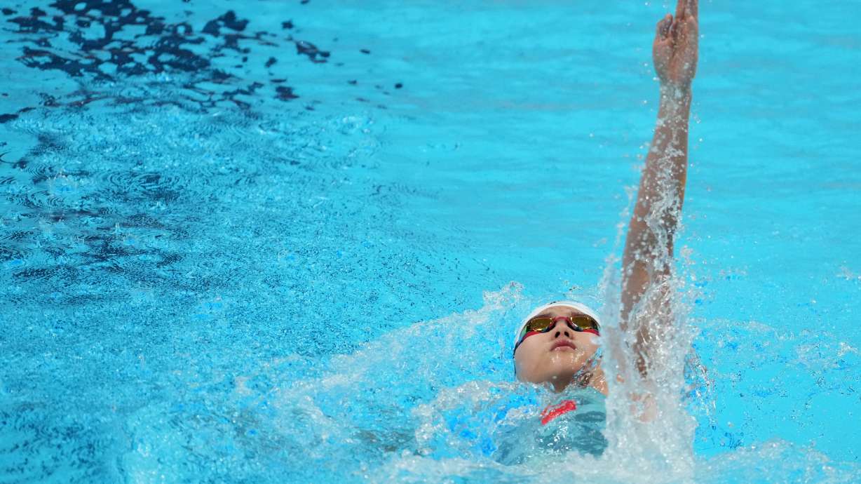 Yu Zidi of China competes in the women's 400-meter individual medley heats in swimming at the Asian Games in Tokyo, Japan, Wednesday, Sept. 23, 2026.