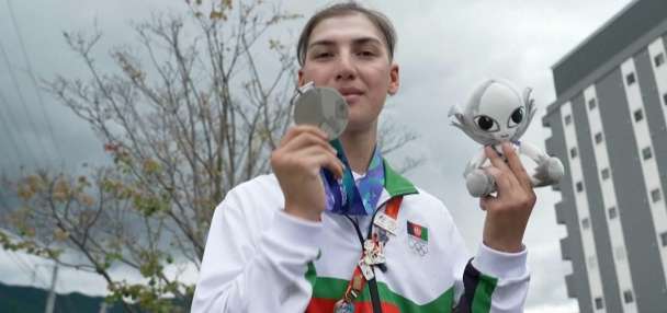 Afghan female cyclist wins silver at Asian Games after disguising herself as a man to train
