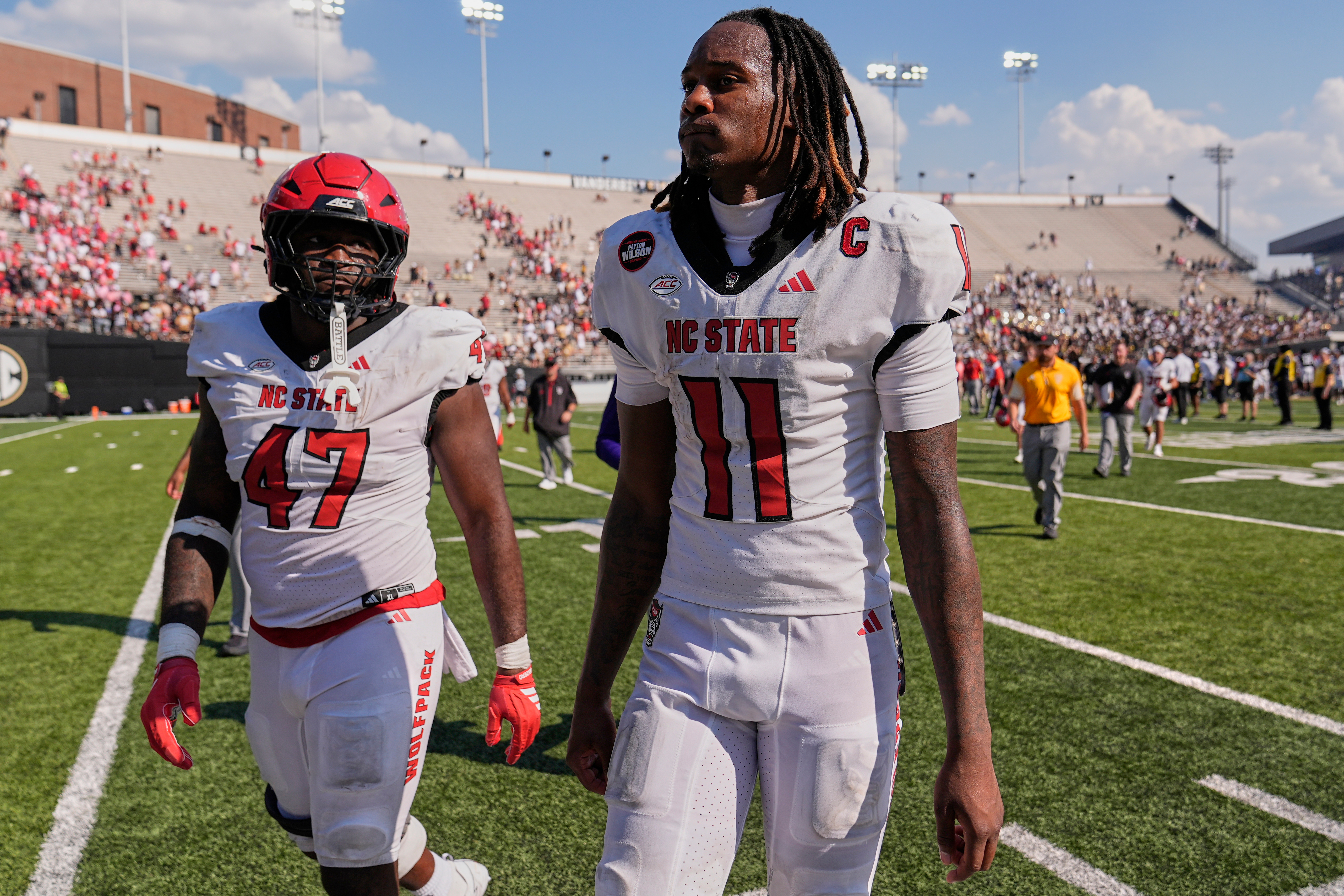 North Carolina State quarterback CJ Bailey (11) walks off the field after the team's loss in an NCAA college football game against Vanderbilt, Saturday, Sept. 19, 2026, in Nashville, Tenn. 