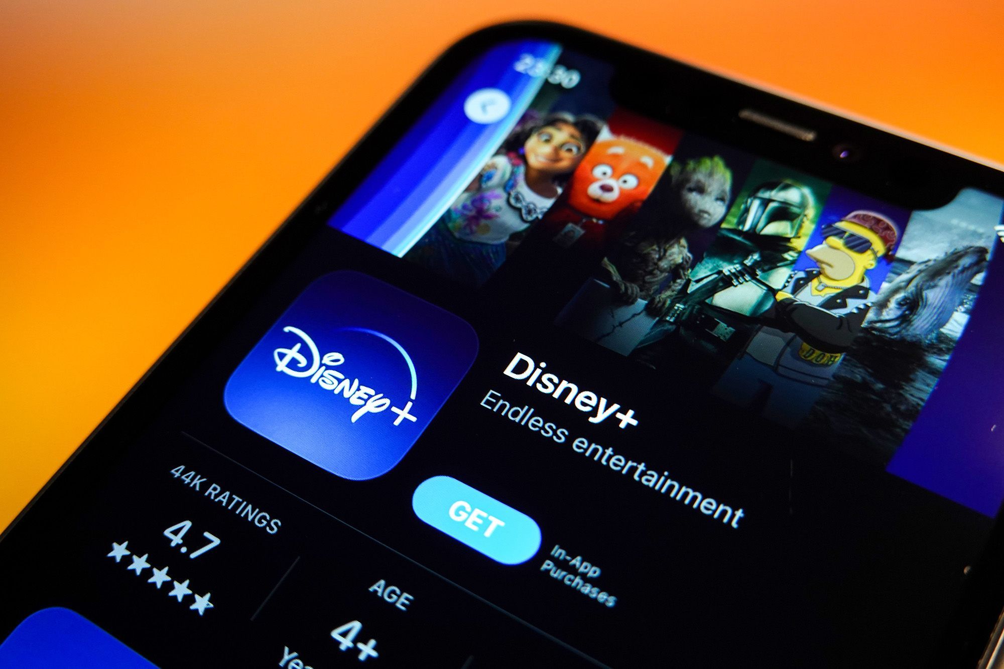 In this photo illustration, the Disney+ logo is displayed in the Apple App Store on an iPhone.