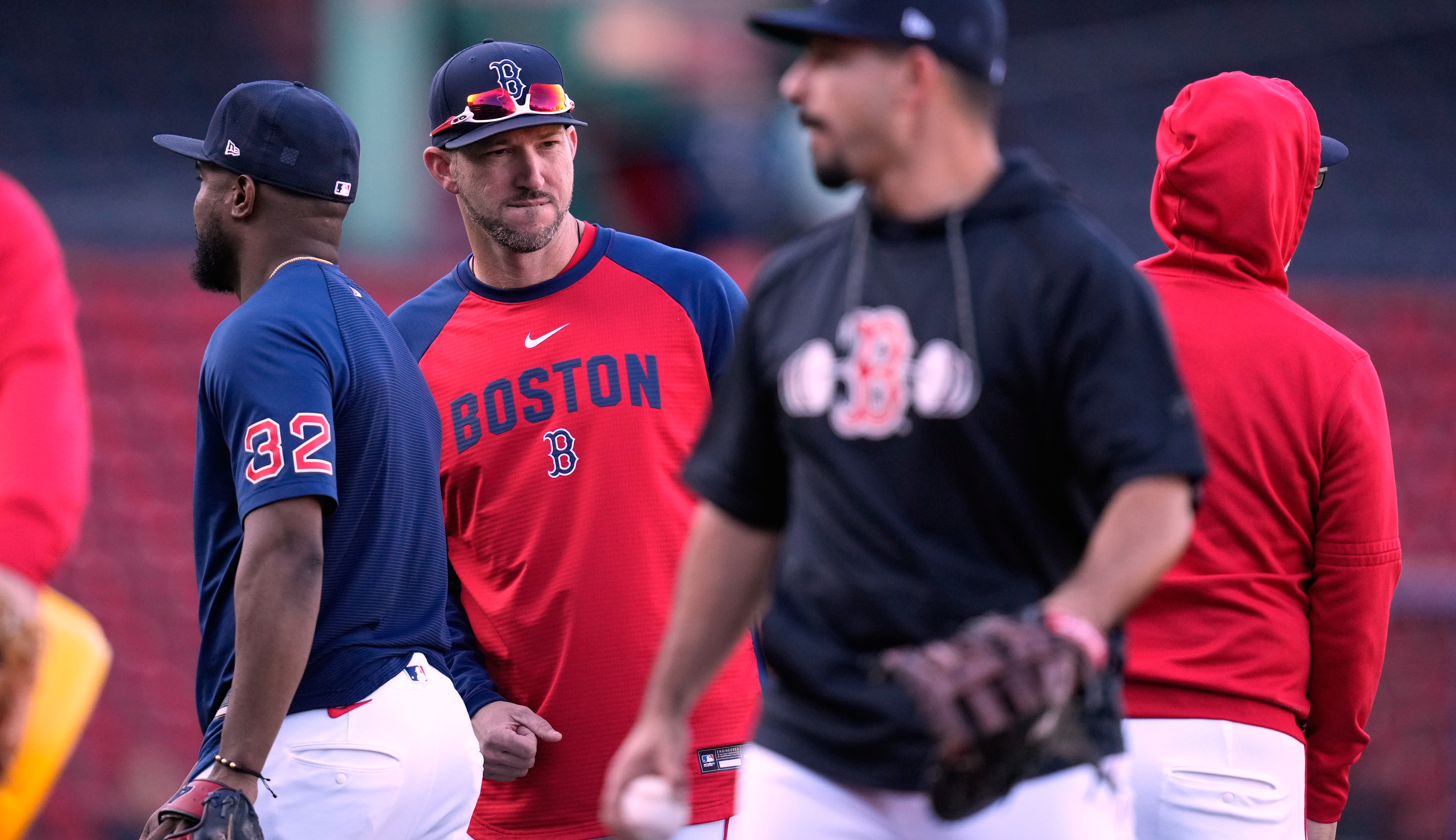 Boston Red Sox manager Chad Tracy talks with his players during batting practice prior to a baseball game against the Cleveland Guardians, Tuesday, Sept. 22, 2026, in Boston. 