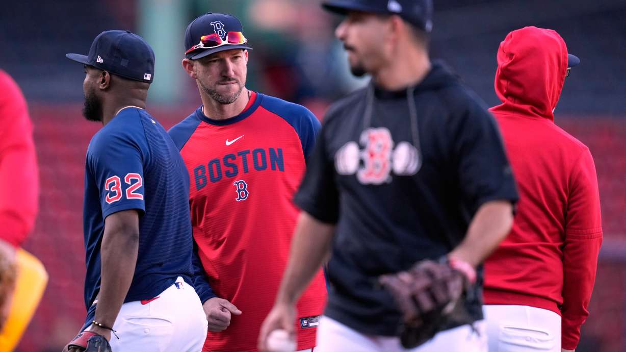 Boston Red Sox manager Chad Tracy talks with his players during batting practice prior to a baseball game against the Cleveland Guardians, Tuesday, Sept. 22, 2026, in Boston.