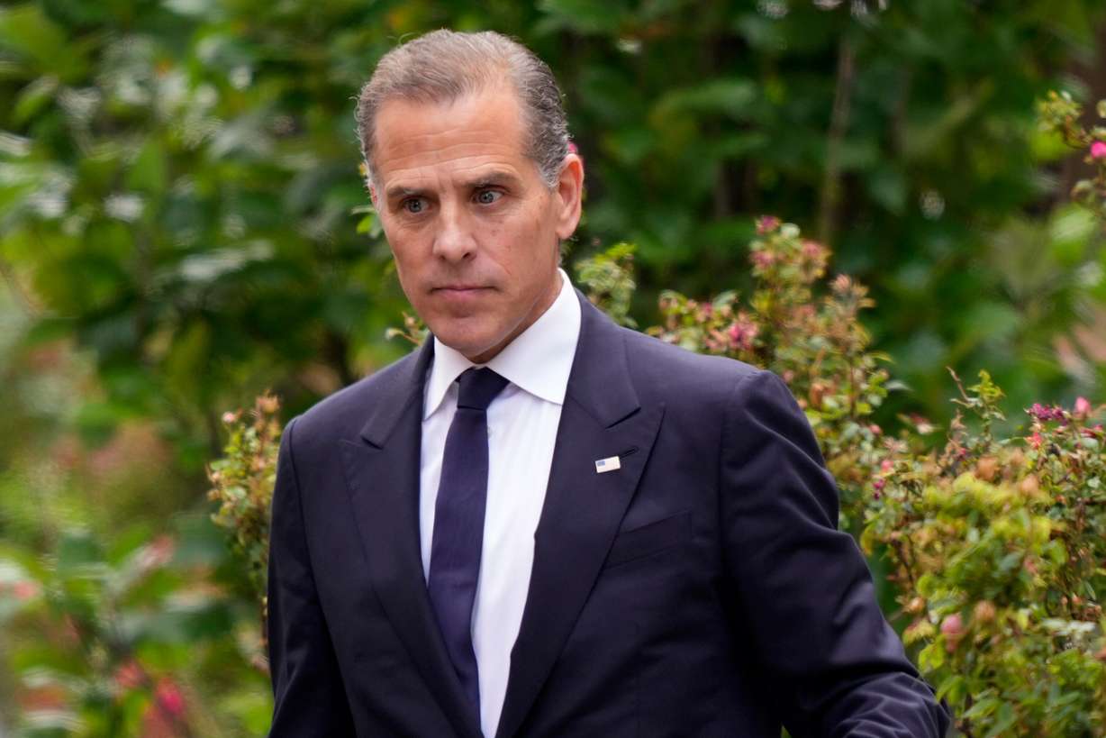 Hunter Biden departs from federal court June 11, 2024, in Wilmington, Del. Sen. John Curtis is requesting subpoenas for both Biden and Donald Trump Jr.