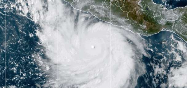 Powerful Hurricane Polo drenches Mexico's coast from offshore as Nolo nears Hawaii