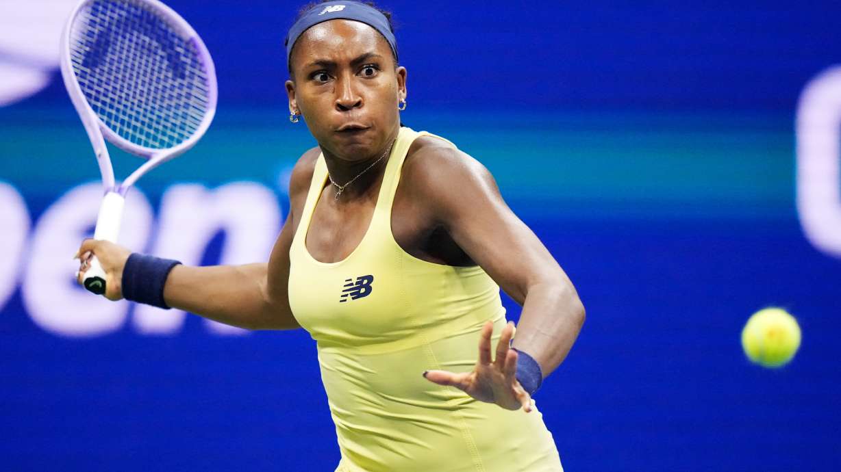 Coco Gauff, of the United States, returns the ball to Elena Rybakina, of Kazakhstan, during the women's singles semifinals of the U.S. Open tennis championships Thursday, Sept. 10, 2026, in New York.