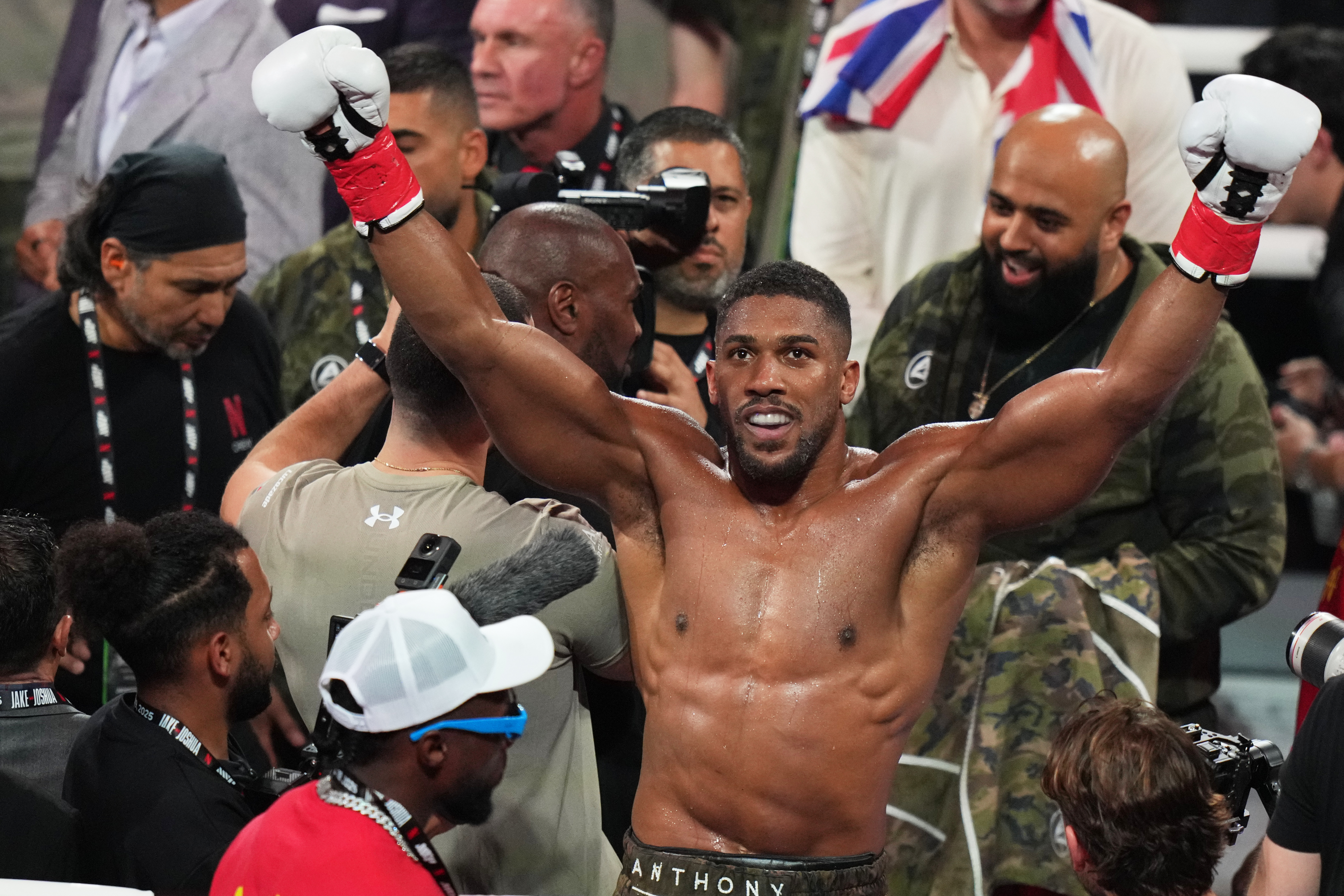 FILE - Anthony Joshua reacts after defeating Jake Paul in their heavyweight boxing match, Friday, Dec. 19, 2025, in Miami. 