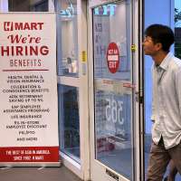 Claims for unemployment benefits drop to 197,000, lowest since mid-July as layoffs remain rare
