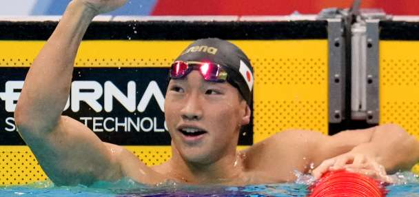 Shin Ohashi of Japan sets world record in 200-meter breaststroke at the Asian Games