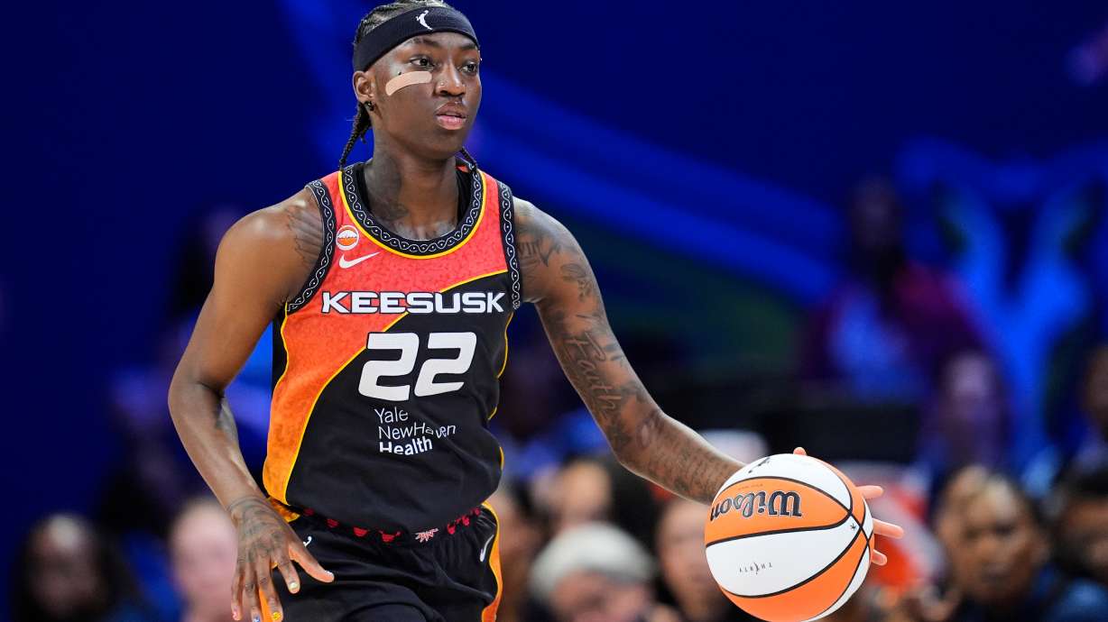 FILE - Connecticut Sun guard Saniya Rivers handles the ball during a WNBA basketball game against the Dallas Wings, Aug. 30, 2026, in Arlington, Texas.