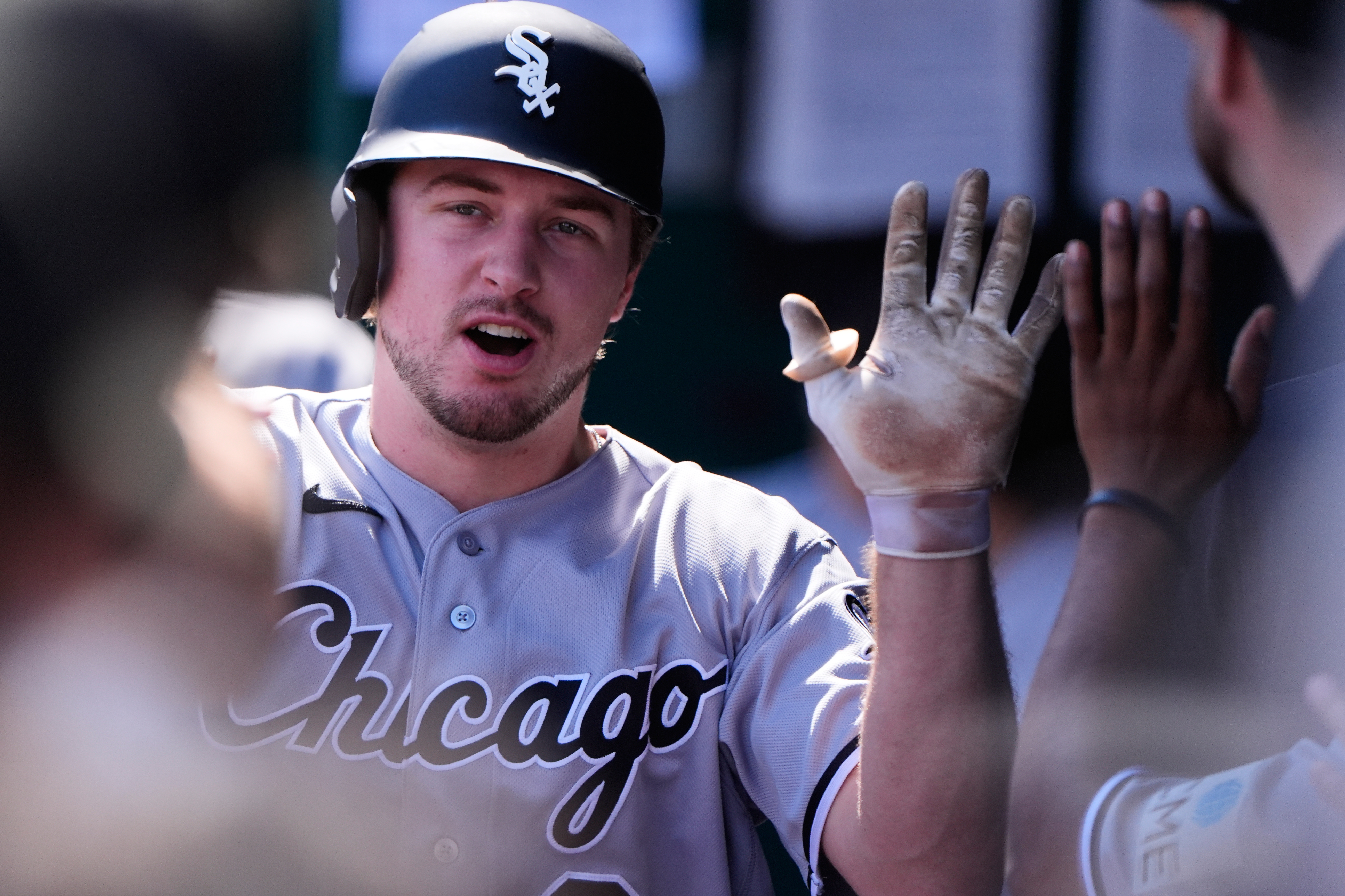 Chicago White Sox's Kyle Teel celebrates in the dugout after scoring on a sacrifice fly hit by Andrew Benintendi during the first inning of a baseball game against the Kansas City Royals, Thursday, Sept. 24, 2026, in Kansas City, Mo. 