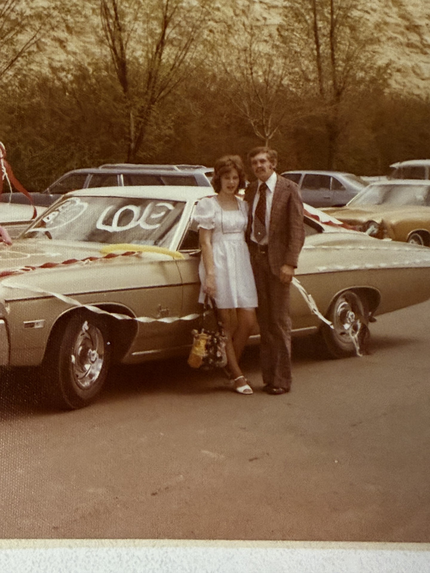 Gloria and Richard Gratton were engaged in 1974 in front of a historic 7-up sign that has recently been uncovered on Main Street in Cedar City.