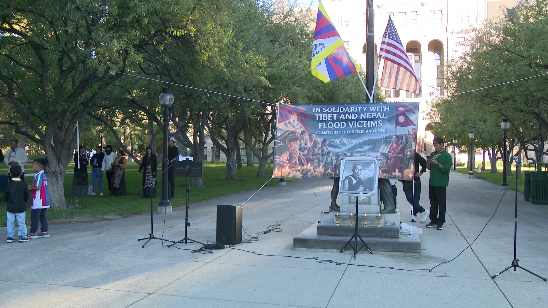 Participants at the Solidarity Candlelight Vigil held Wednesday night at Salt Lake City Hall. It honored those impacted by recent flooding in Tibet and Nepal.
