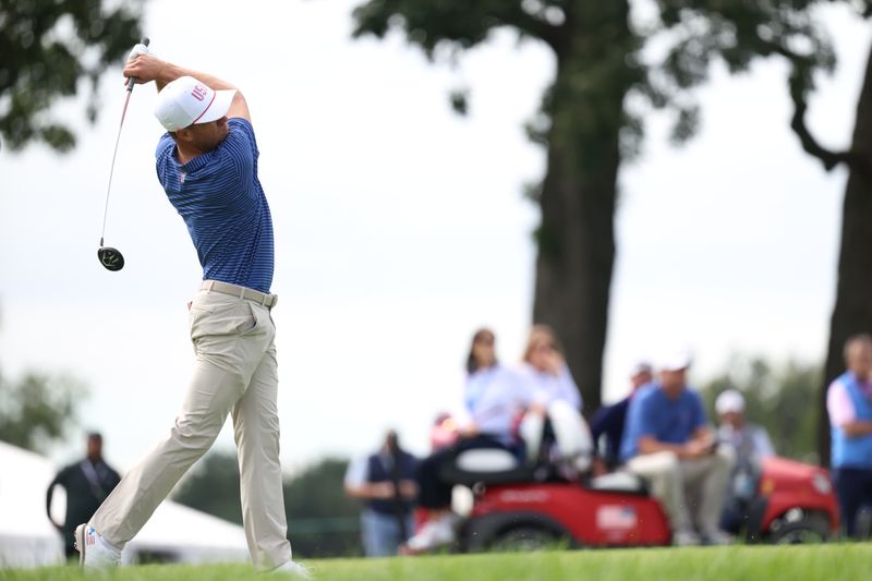Sep 24, 2026; Medinah, Illinois, USA;  Justin Thomas of the U.S. Team tees off at hole six during the first round of the Presidents Cup.