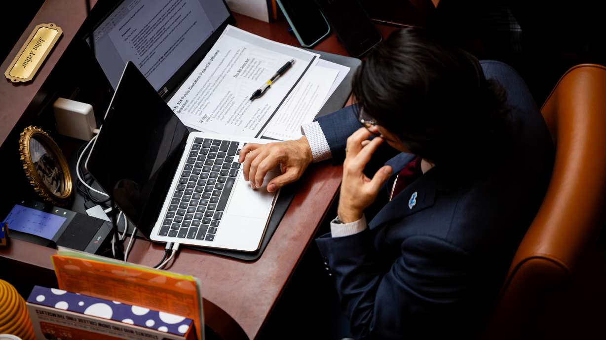 Rep. John Arthur, D-Holladay, works in the Utah House of Representatives Chamber during the legislative session at the Capitol in Salt Lake City on Feb. 24. Arthur is a school teacher who was named 2021 Utah Teacher of the Year.