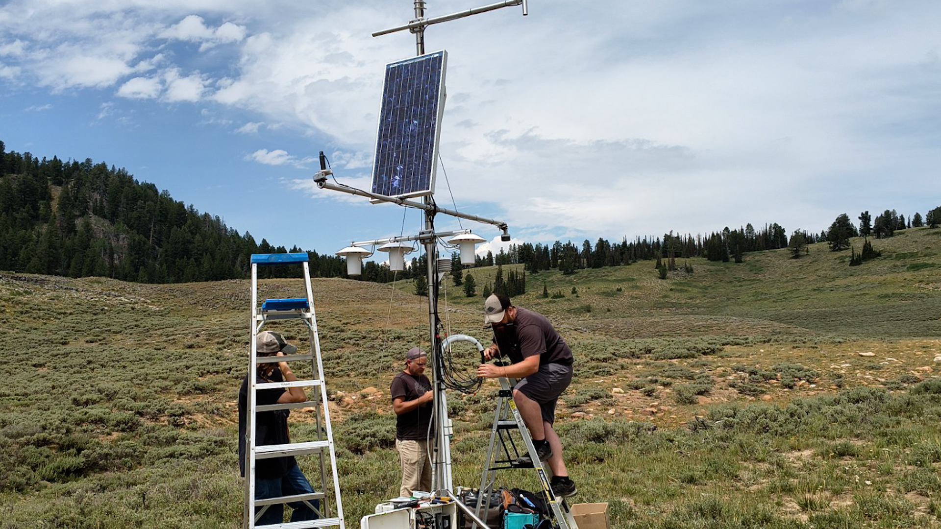 Installing a new weather station at Peter Sinks Basin in northern Utah's Cache County.