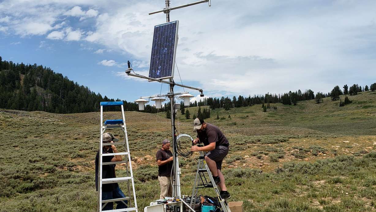 Installing a new weather station at Peter Sinks Basin in northern Utah's Cache County.