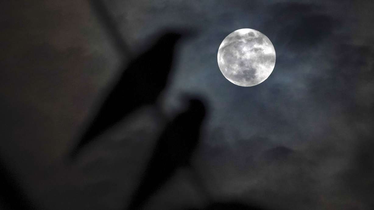 The full harvest moon rises over Sri Lanka in September 2023. The harvest moon will pair up with Saturn for a special 2-for-1 celestial display this weekend.