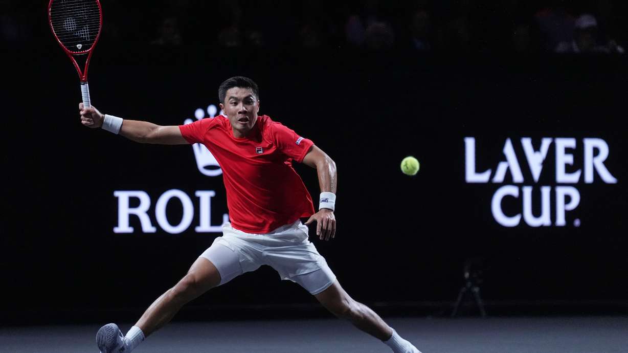 Team World's Brandon Nakashima plays a return to Team Europe's Jakub Mensik during a Laver Cup tennis tournament match in London, Friday, Sept. 25, 2026.