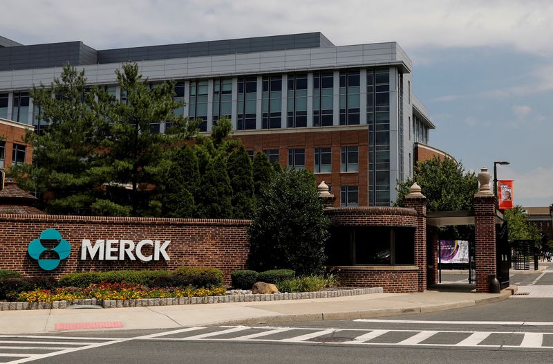 FILE PHOTO: The Merck logo is seen at a gate to the Merck & Co campus in Rahway, New Jersey, U.S., July 12, 2018.