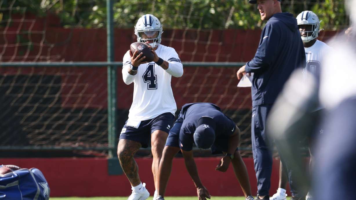 Dallas Cowboys quarterback Dak Prescott (4) works out during a practice for an NFL football game against the Baltimore Ravens in Rio de Janeiro, Friday, Sept. 25, 2026.