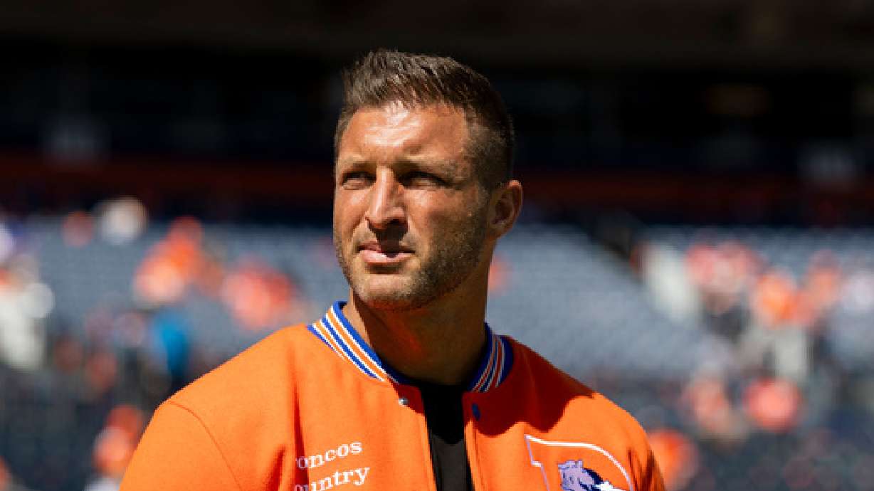 Tim Tebow looks on prior to an NFL football game against the Jacksonville Jaguars, Sunday, Sept. 20, 2026 in Denver.