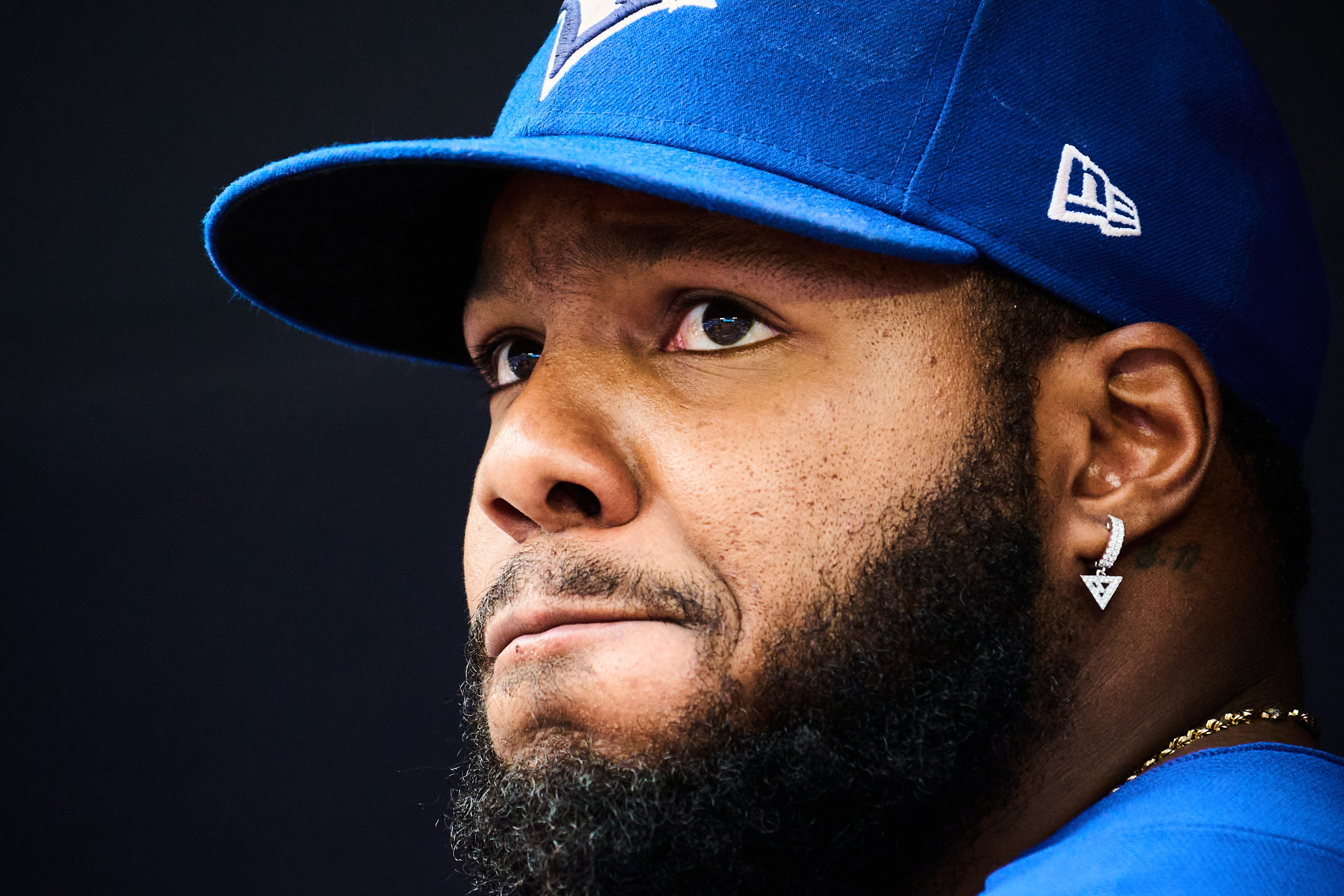 Toronto Blue Jays' Vladimir Guerrero Jr. looks out of the dugout before of a baseball game against the Baltimore Orioles in Toronto, Saturday, Sept. 12, 2026. 