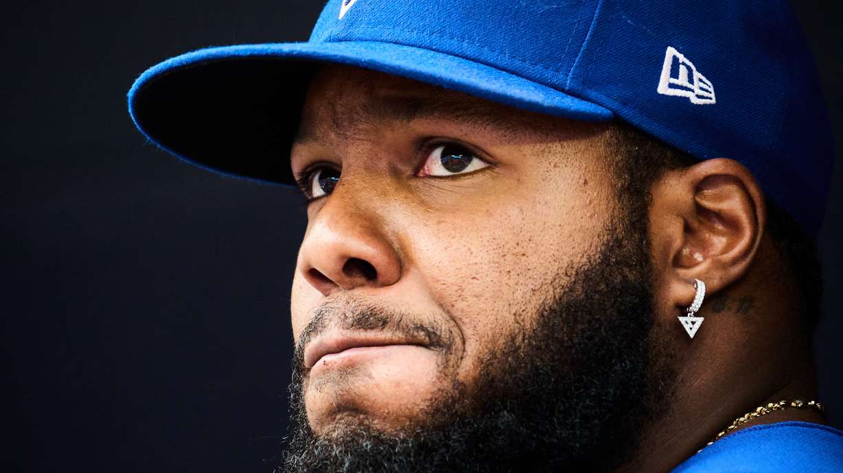 Toronto Blue Jays' Vladimir Guerrero Jr. looks out of the dugout before of a baseball game against the Baltimore Orioles in Toronto, Saturday, Sept. 12, 2026.