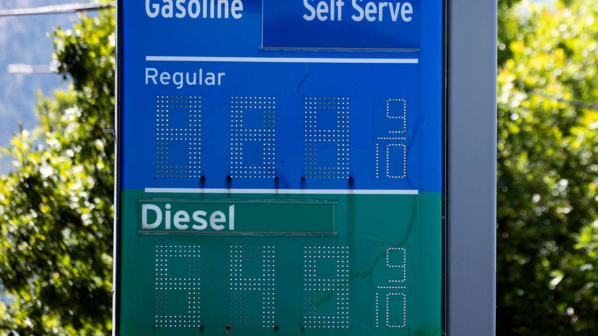 A sign displays the price of regular gasoline and diesel in Salt Lake City on June 15. Three months later, the cost of diesel has grown past $6 a gallon.