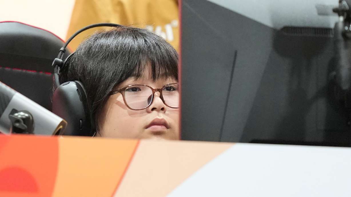 Japan's Yuki Kurihara prepares for his Puyo Puyo Champions esports quarterfinal match against Singapore's Justine Koh Mun June at the Asian Games in Nagoya, Japan, Saturday, Sept. 26, 2026. CORRECTION: Corrects first name to Yuki instead of Yuri