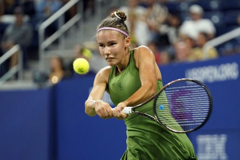 Aug 28, 2023; Flushing, NY, USA; Tatiana Prozorova hits to Caroline Wozniacki of Denmark on day one of the 2023 U.S. Open at the Billie Jean King Tennis Center.