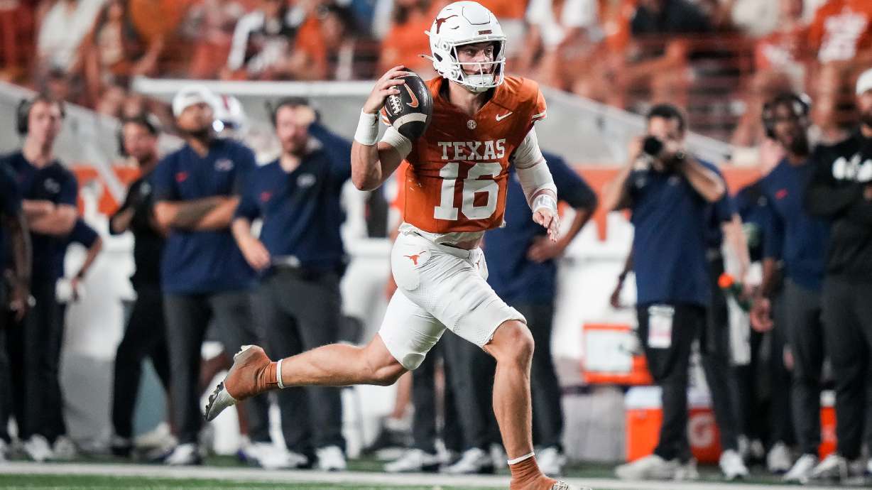 Texas Longhorns quarterback Arch Manning (16) runs the ball in the third quarter of the Longhorns' game against the UTSA Roadrunners at Royal-Memorial Stadium in Austin, Texas, Sept. 19, 2026.