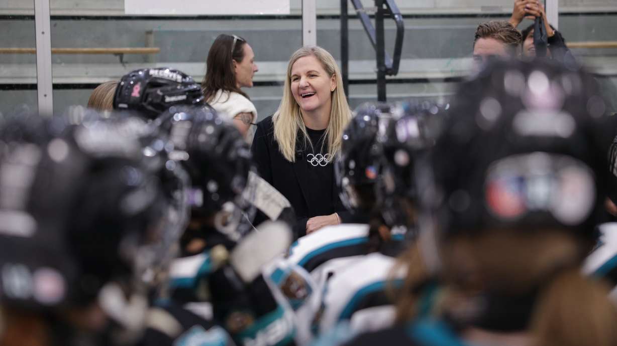 International Olympic Committee President Kirsty Coventry visits with members of the Utah Lady Grizzlies hockey team Wednesday, at the Steiner Ice Rink in Salt Lake City. Coventry spent the day in Utah talking about the 2034 Winter Olympics.